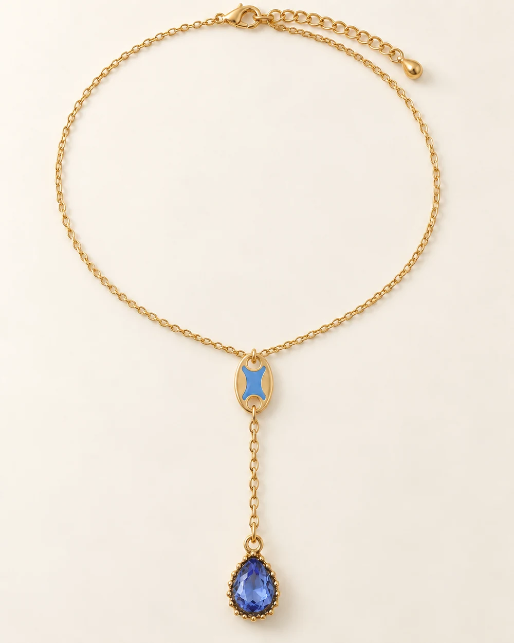 Ondine — Une ligne en Y : connecteur ovale bleu, puis goutte de verre bleu clair montée au bout d’une descente de 8 cm.